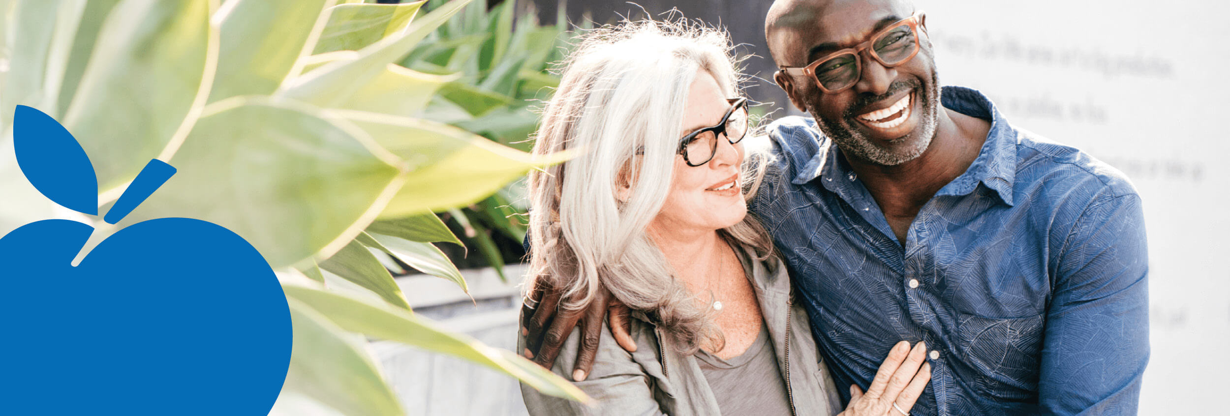 2025 Apple Bank Header Photos10 Diverse couple walking along sidewalk
