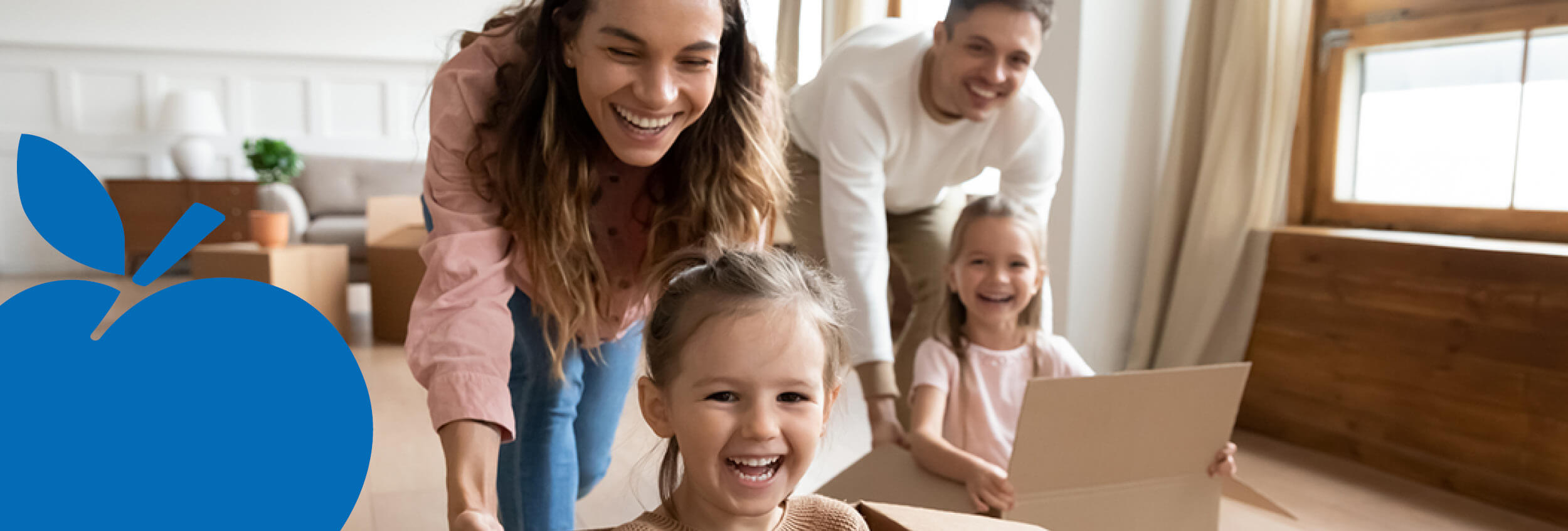 2025 Apple Bank Header Photos11 Parents playing race car in living room with their kids