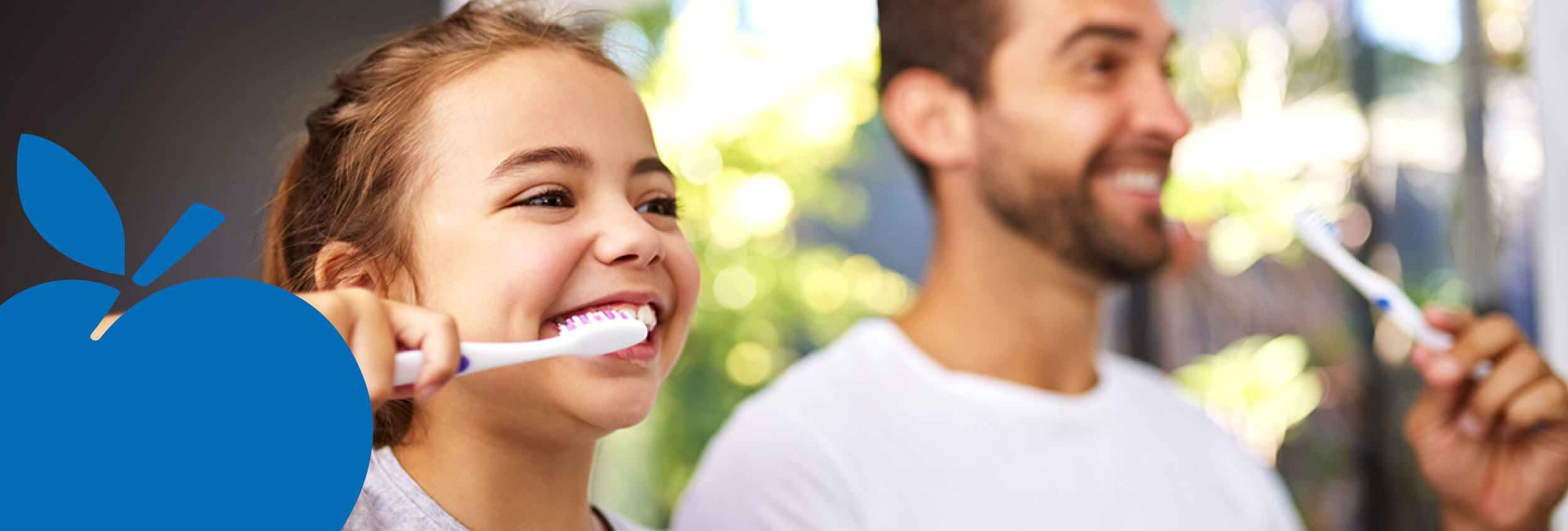 2025 Apple Bank Header Photos2 Dad and daughter brushing teeth together.