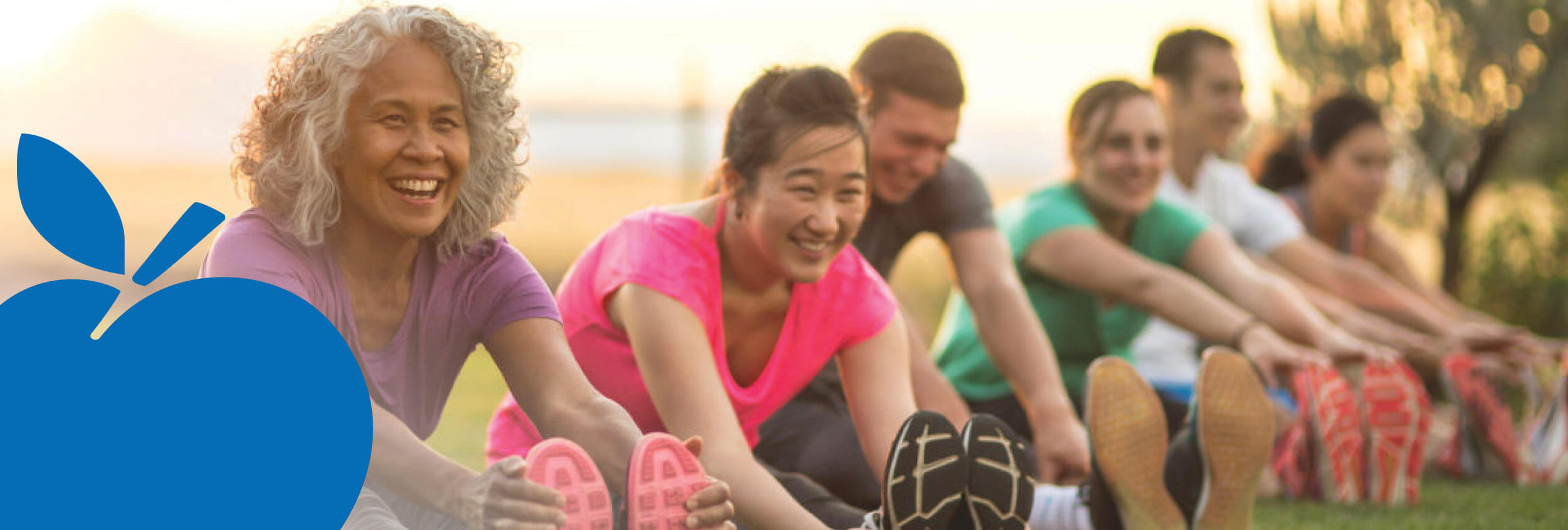 2025 Apple Bank Header Photos22 Group performing leg stretches